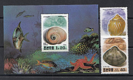 Коралловые рыбки. Морские ракушки. КНДР 1994 год.